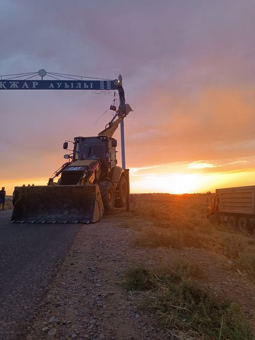 Экскаватор погрузчика 3в1