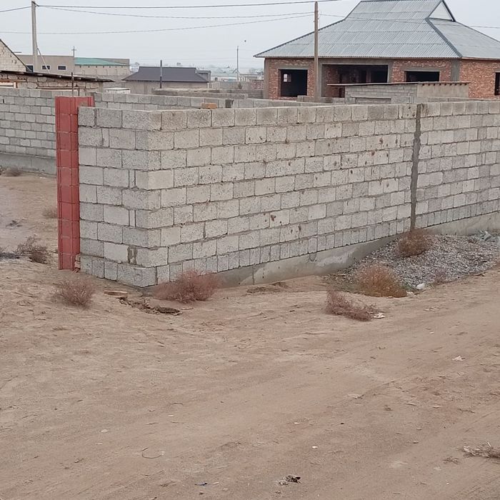 Uchastka yer fundament qurilgan