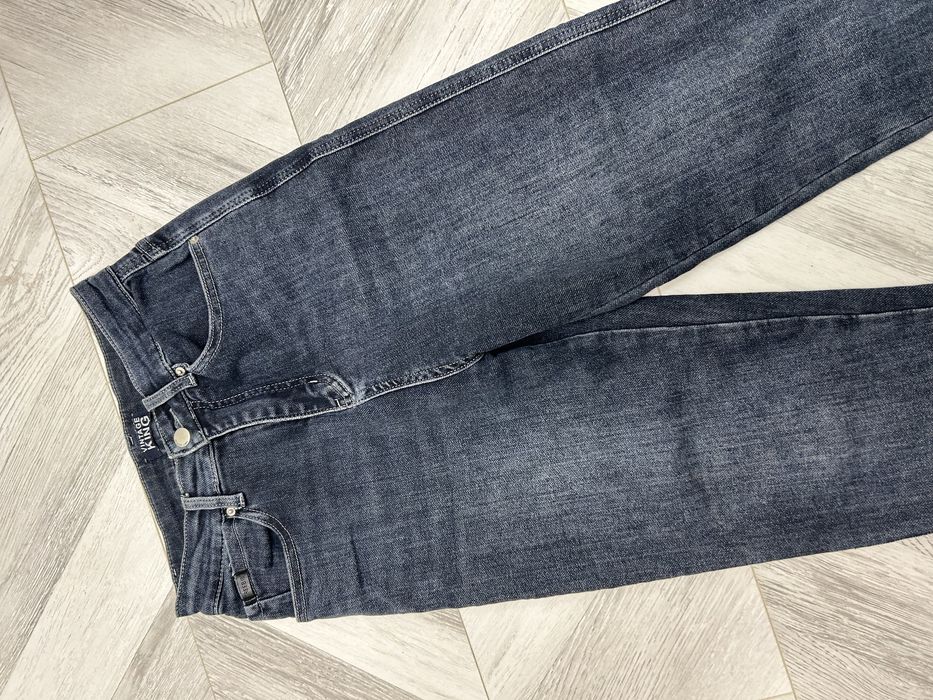 Джинсы почти новые