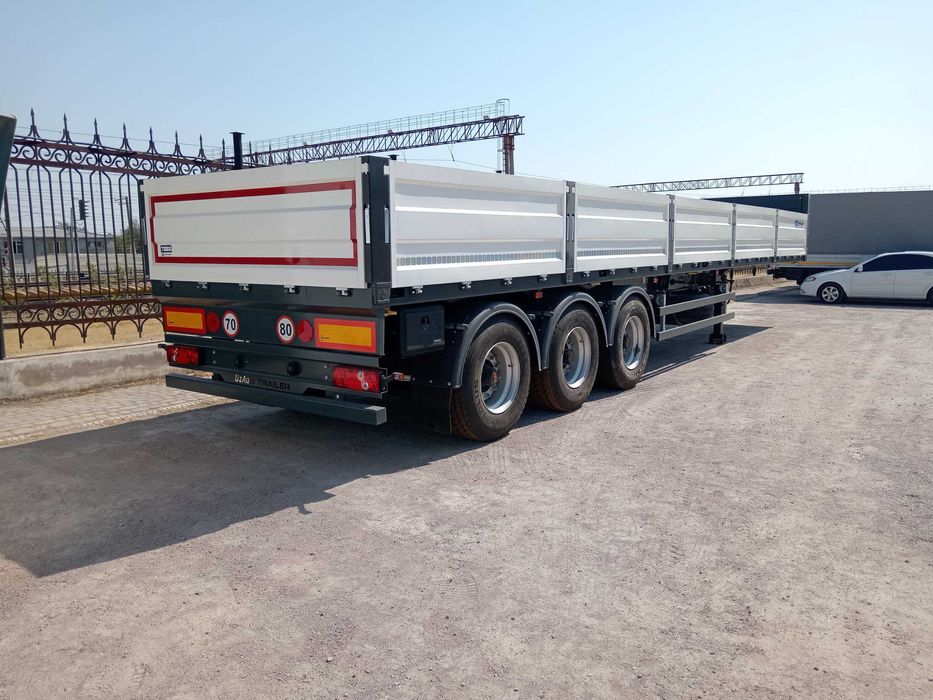 Полуприцеп бортовой контейнеровоз UzAutoTrailer