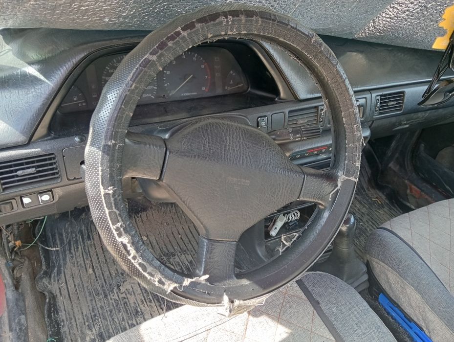 Мазда седан 323 г