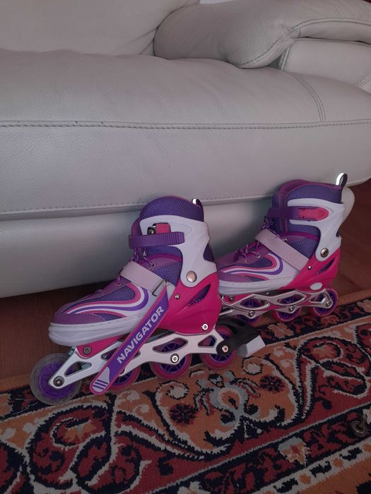 Роликовые коньки