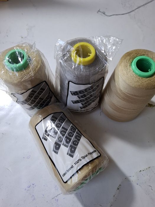 Нитки швейные машины.