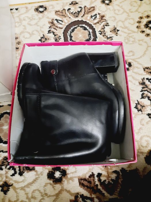 Кожанные сопоги черного цвета