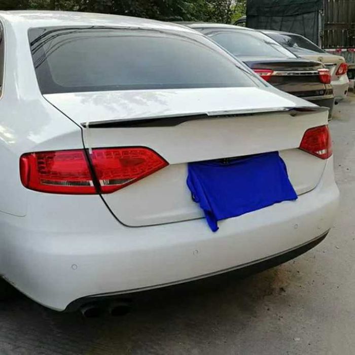 Eleron Portbagaj Lip Codita Audi A4 B8 2009-12, Model M4, Negru Lucios