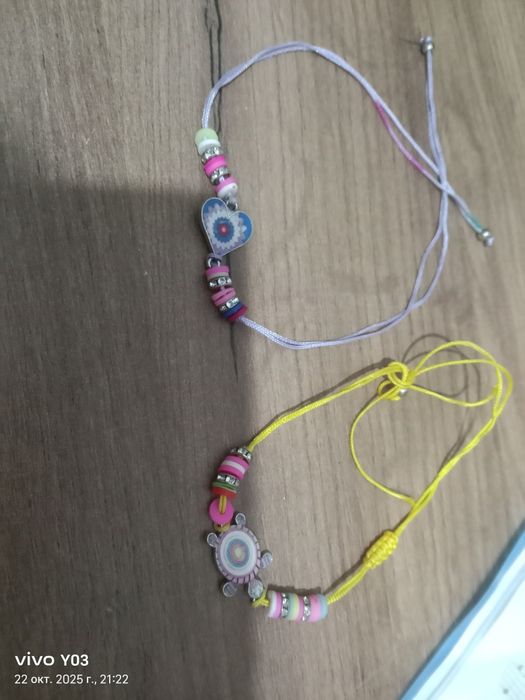 Браслеты из веровочек, сереневый и желтый