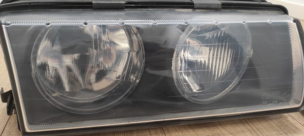 Faruri BMW e36 NOI Hella cu sticle zkw