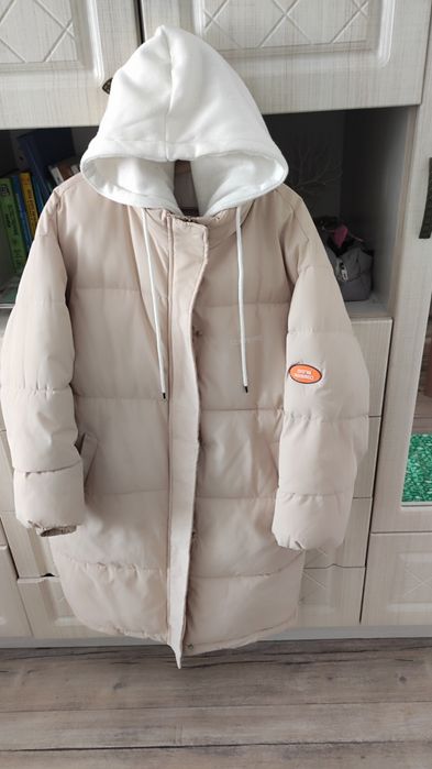 Продам  женский пуховик