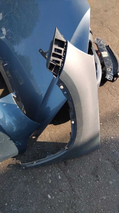 Aripa stanga/dreapta Volkswagen Tiguan an 2009