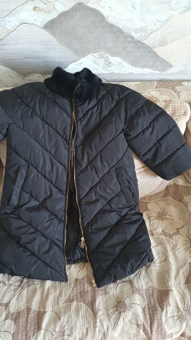 Продам зимний пуховик