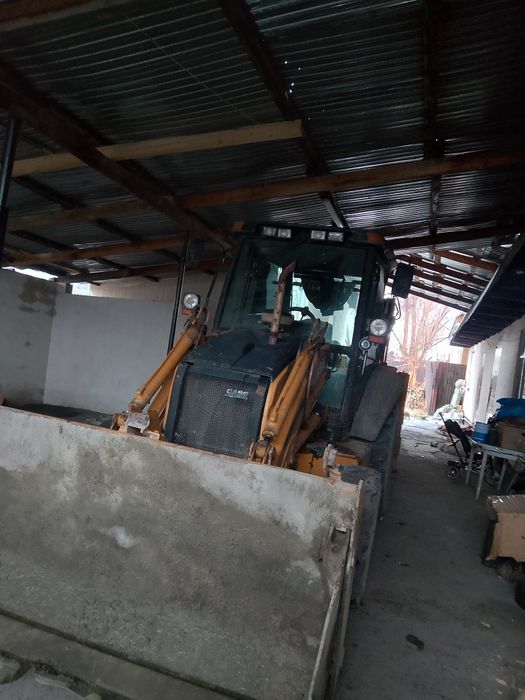 Услуги погрузчик-эксковатора 3в1