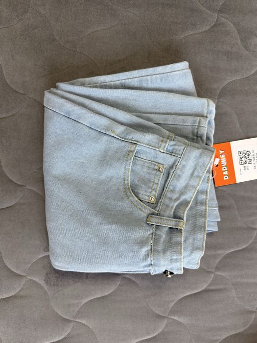 Джинсы новые