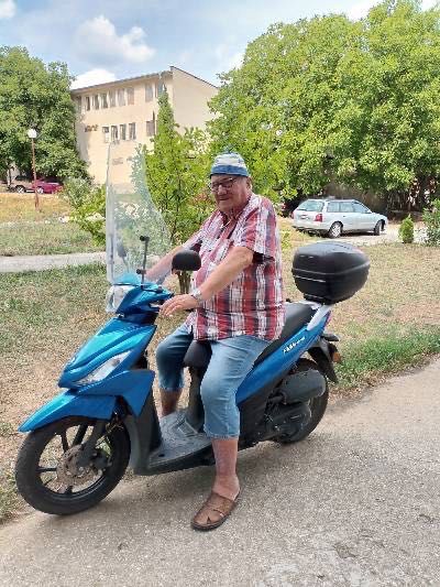 Мотоциклет Сузуки УК 110