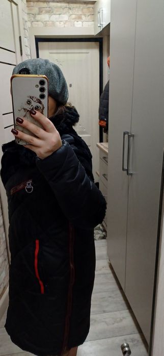 Продам женский пуховик