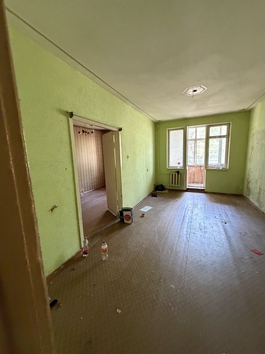 Навои шахар милий банк. Оркасидан 1 этаж 3 хоналик квартира сотилади