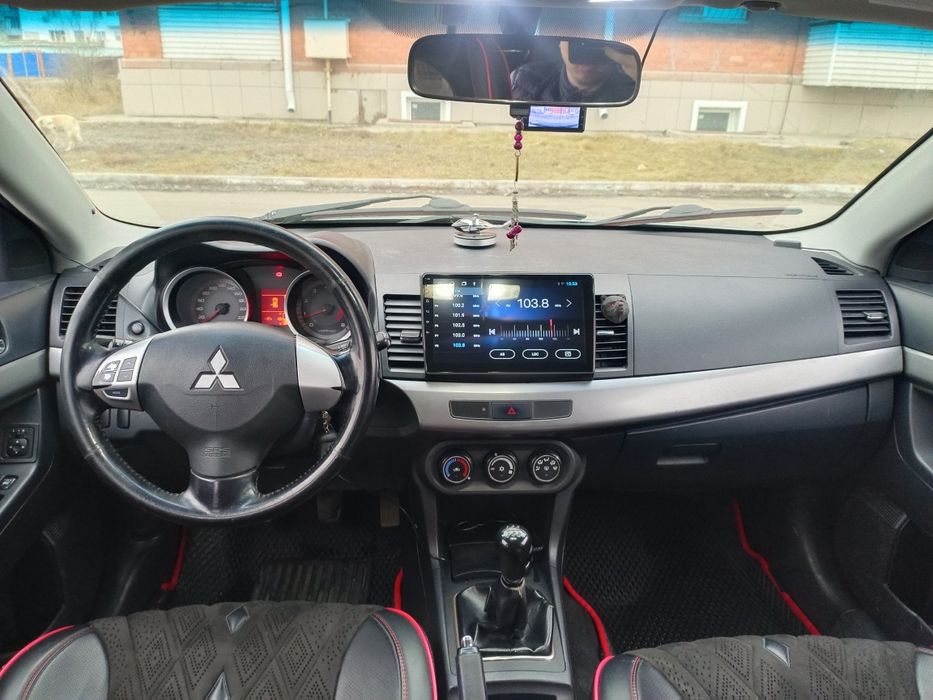 Митсубиси Лансер Х