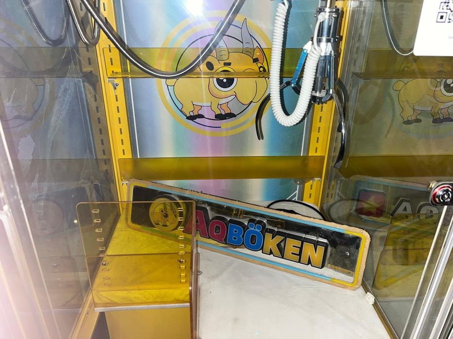 Игровой аппарат хватайка