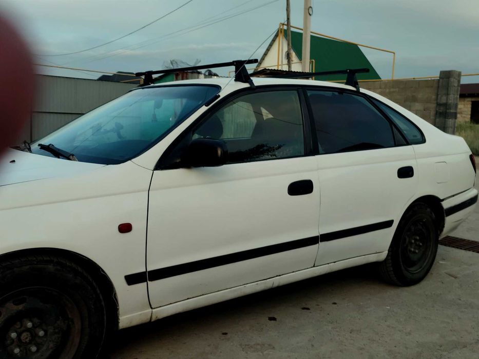 Тайота Карина хэтчбек