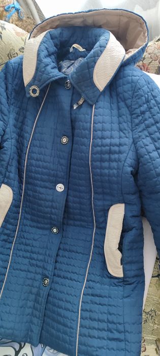 Продам пуховик женский  размер 54