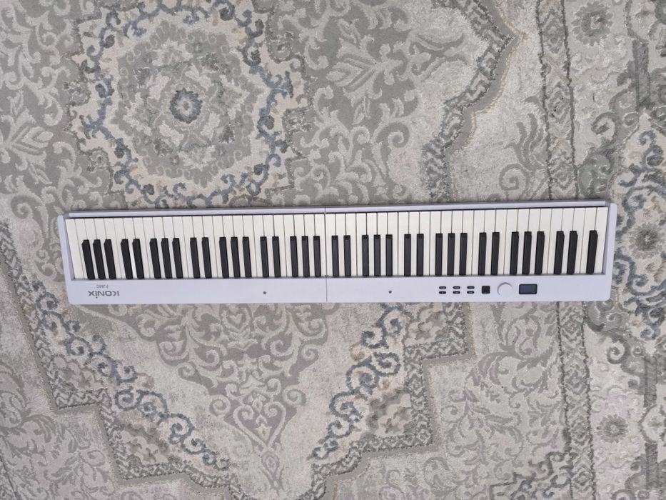 Раскладное пианино