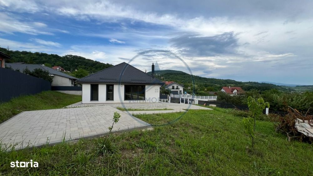 Casa noua 5 camere 146 mp, teren generos de 1.000 mp, zona linistita