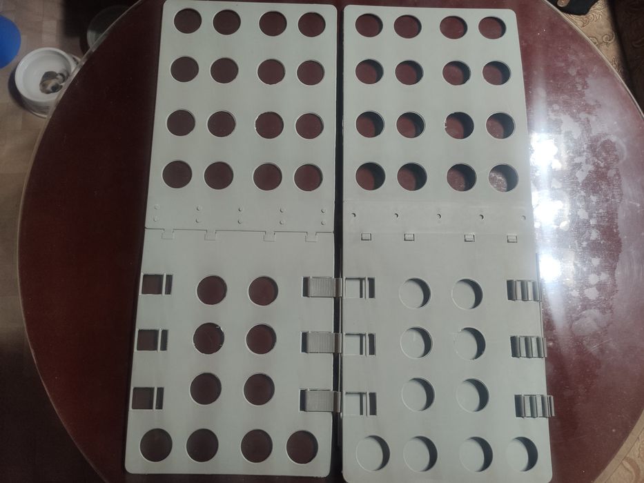 Приспособление для складывания одежды