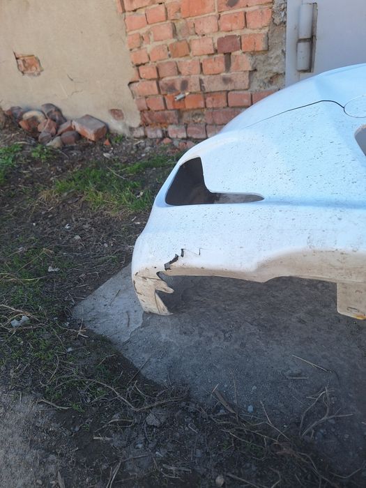 Бампер с ришоткой б.у