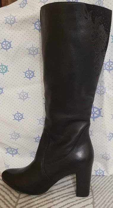 Продам новые сапоги