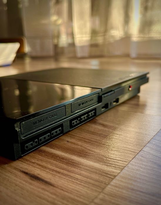 Ps2 slim + една игра