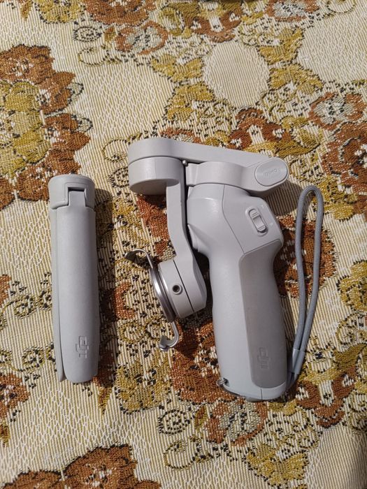 DJI OM 4 – Стабилизатор за телефон в отлично състояние