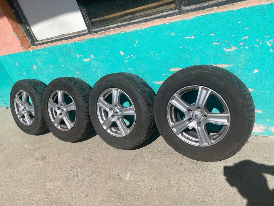 Джанти 16 цола за кия спортиж нова гума 245/70/16