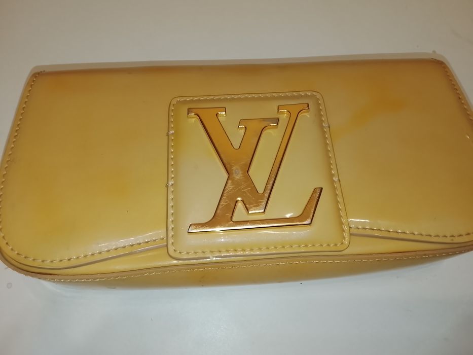 Louis Vuitton Sobe Clutch