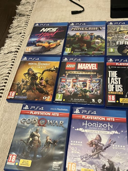 Ps4 Slimp impecabil cu 2 manete, incarcator si 14 jocuri