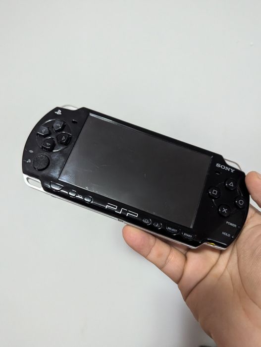 Psp 2004 modat cu jocuri card 64gb