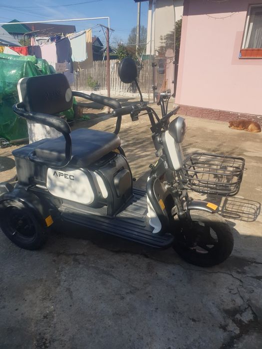 Triciclu electric.