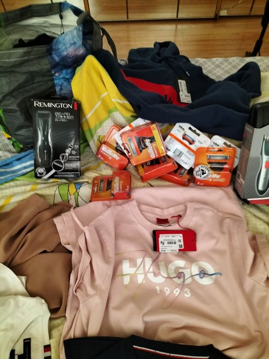 Vând haine de firmã Anglia