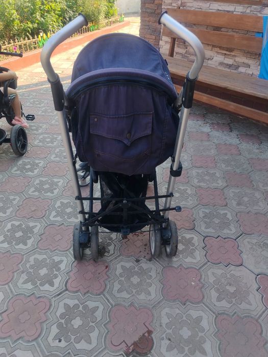 Коляска  и экскаватор