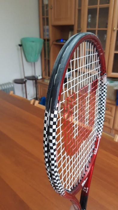 Теннисная ракетка