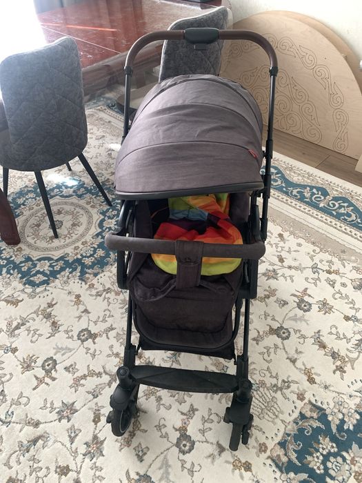 Продам детскую прогулочную коляску Teknum