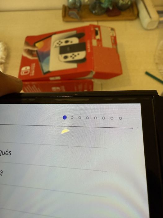 Nintendo Switch OLED + 4 jocuri + card 256GB – impecabilă