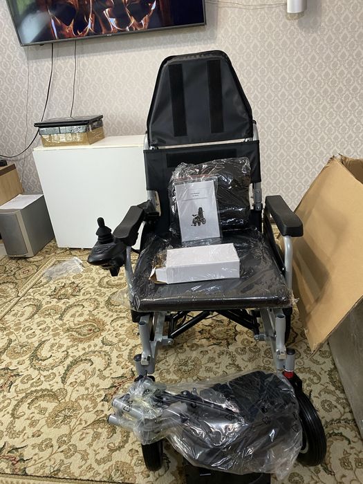 Электрическая коляска для инвалидов