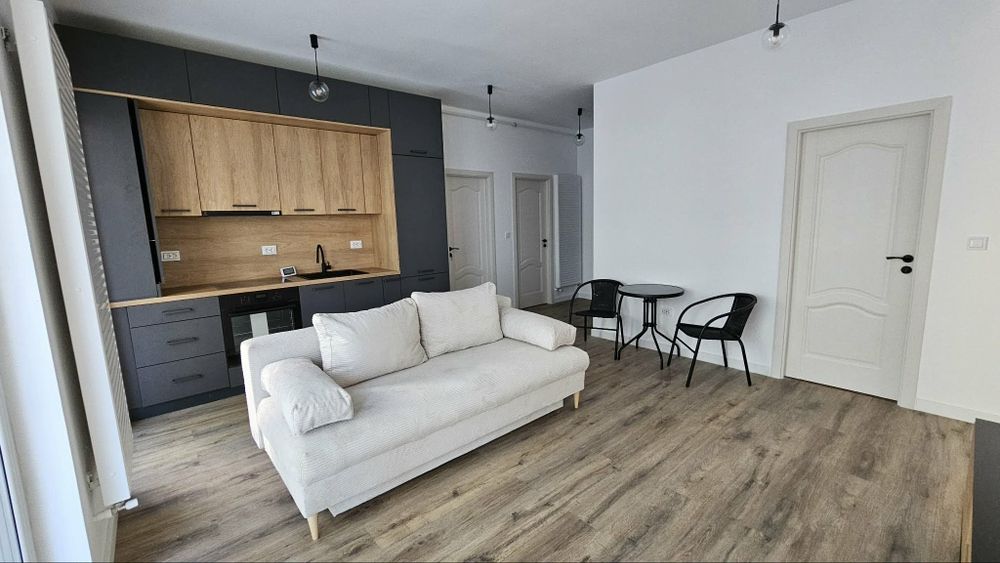Apartament de închiriat cu garaj subteran bloc  nou!