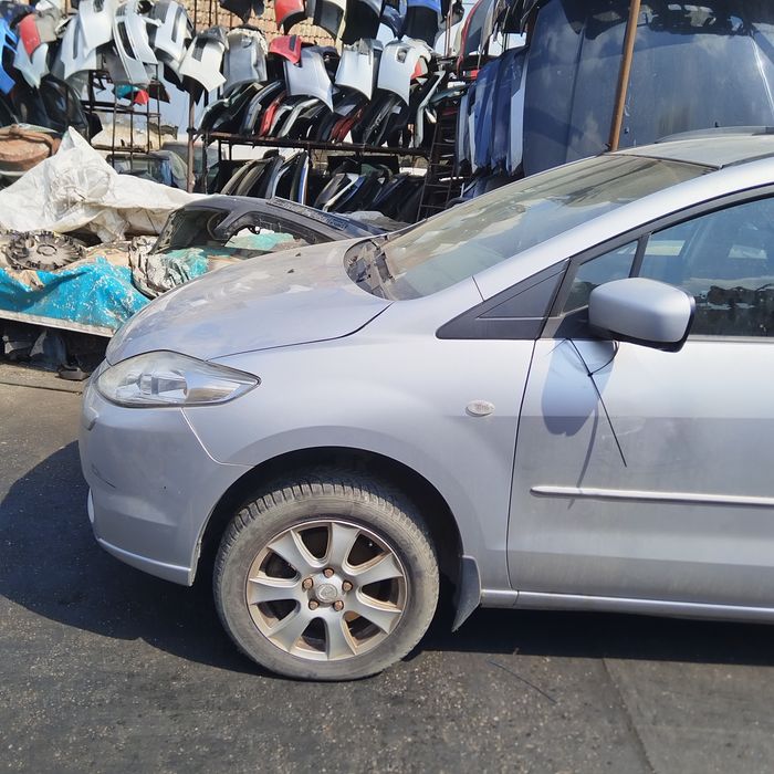 Aripa stanga/dreapta Mazda 5 an 2005-2010