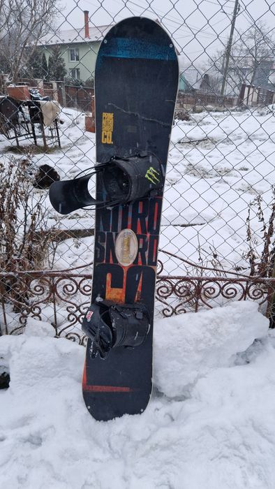 Placă snowboard Nitro + legături Flow (prindere rapidă)
