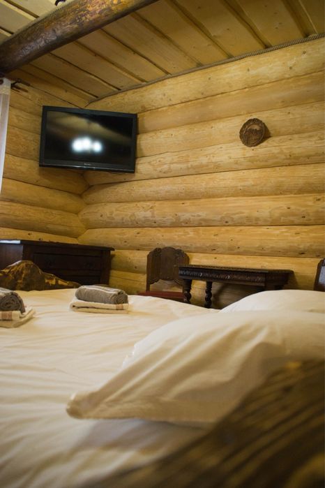 Cabana rustic cu 4 camere,ciubar si sauna