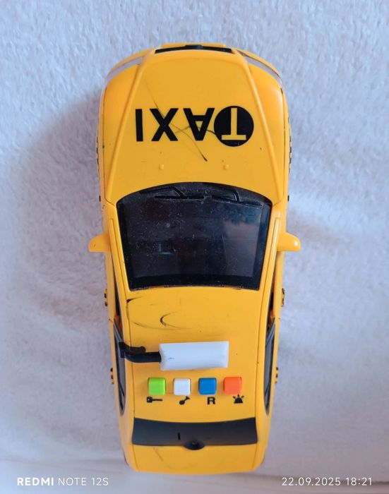Mașină taxi de jucărie