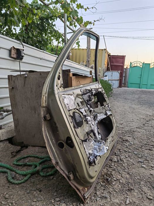 Двери нексия 2009