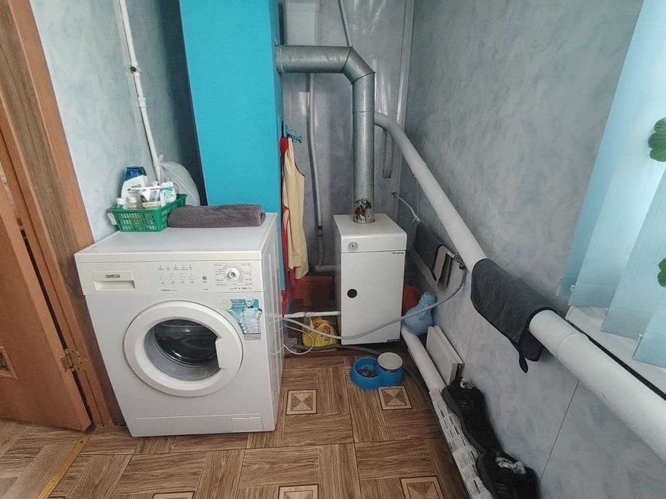 Дом в городе с ухоженным участком