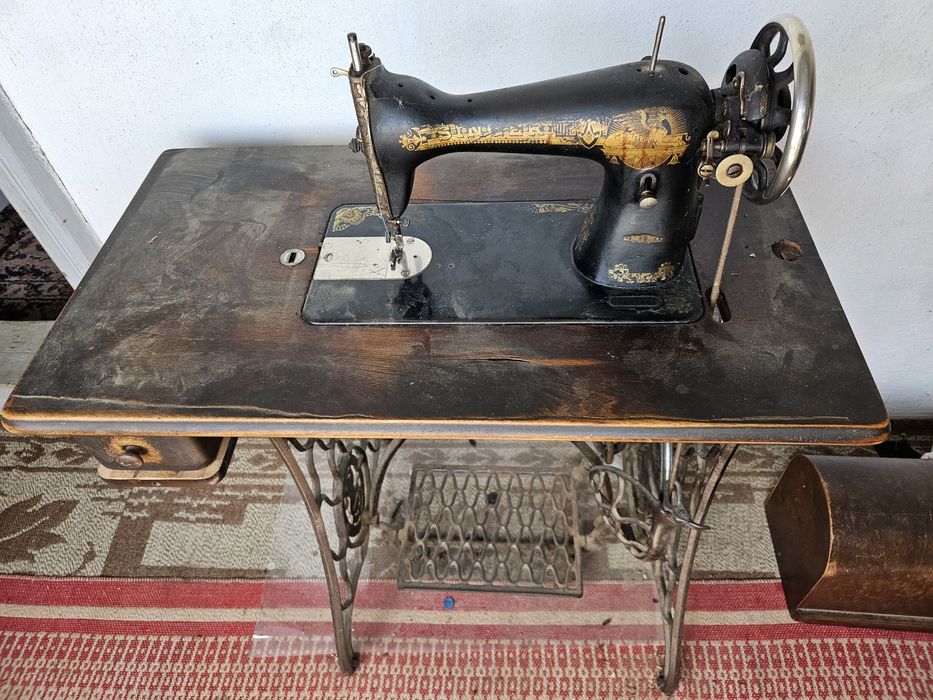Masina de cusut Singer