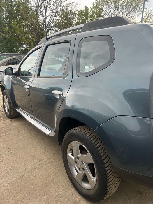 Aripă dreapta spate Dacia Duster